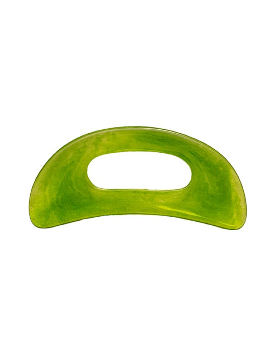 Gua sha tool used for therapeutic purposes.